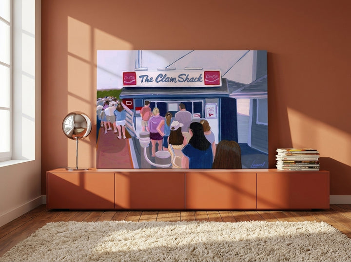 Stretched canvas wall art standing on a sideboard in a retro 70s dining room