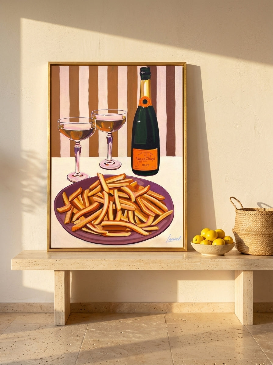 Canvas wall art with a gold leaf surround standing on a console in a Mediterranean living room