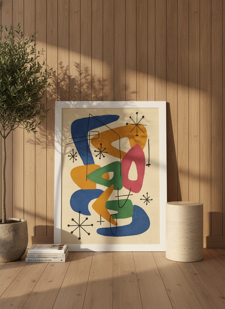 Modern wall art print leaning against the wall in a luxe home office