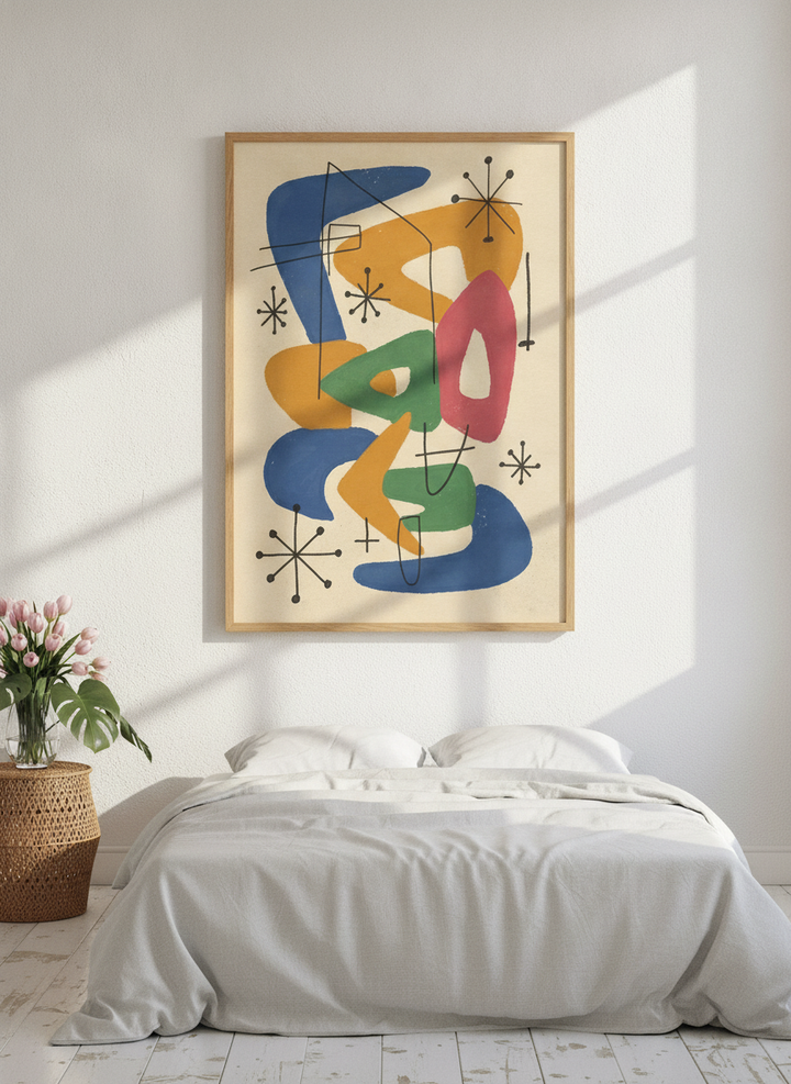Modern wall art print styled on the wall in a bright Scandinavian bedroom