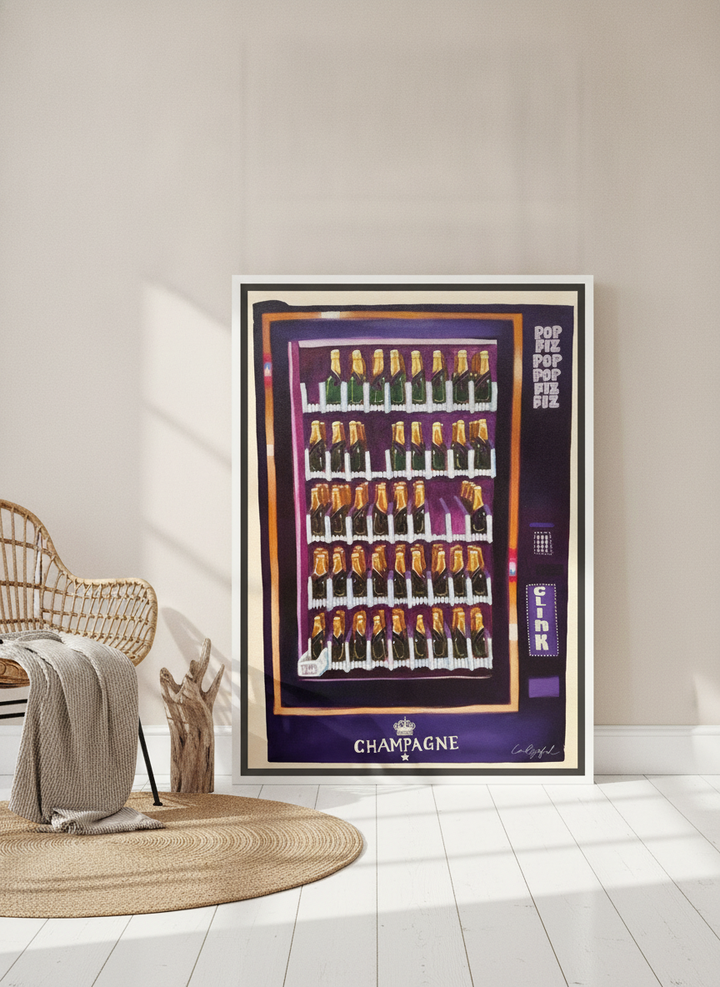 Canvas wall art with a white surround leaning against the wall in a coastal kitchen