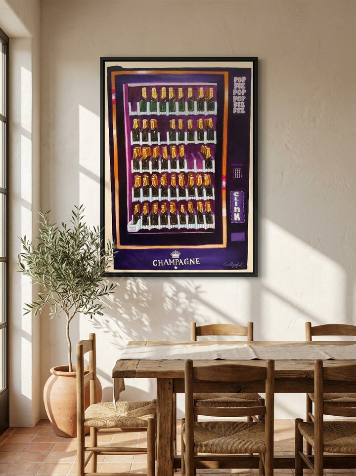 Canvas wall art with a black surround styled on the wall in a Mediterranean dining room