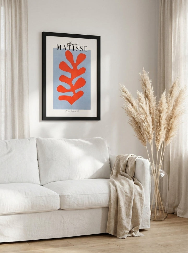 Modern wall art print styled on the wall in a coastal living room