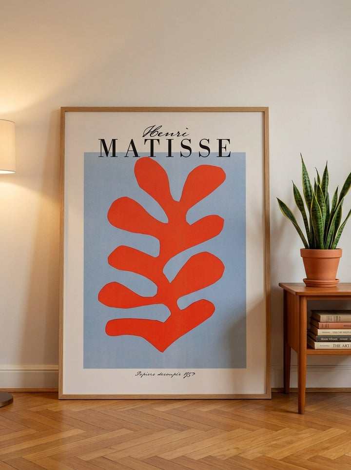 Oversized statement modern wall art print leaning against the wall in a mid-century dining room