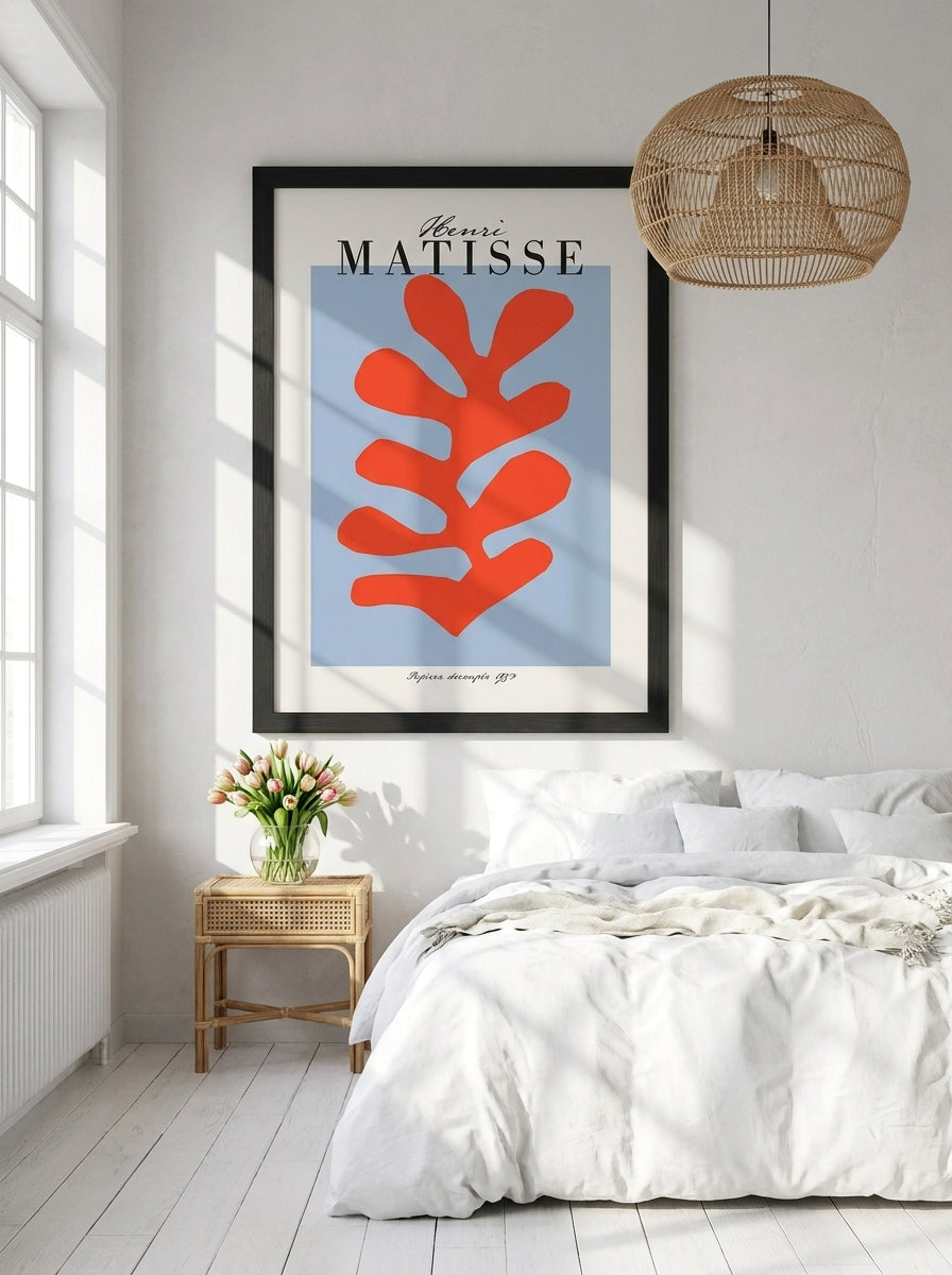 Oversized statement modern wall art print styled on the wall in a bright Scandinavian bedroom