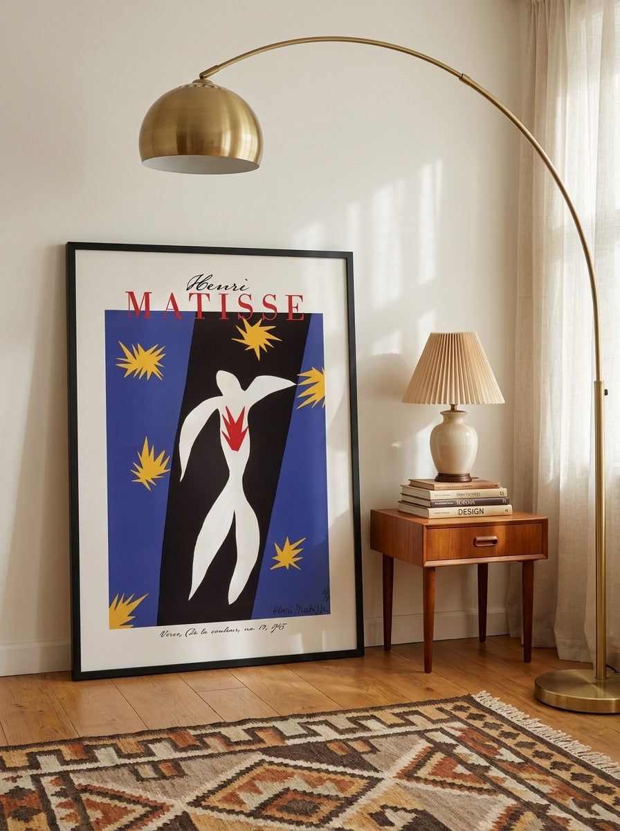 Modern wall art print leaning against the wall in a mid-century home office