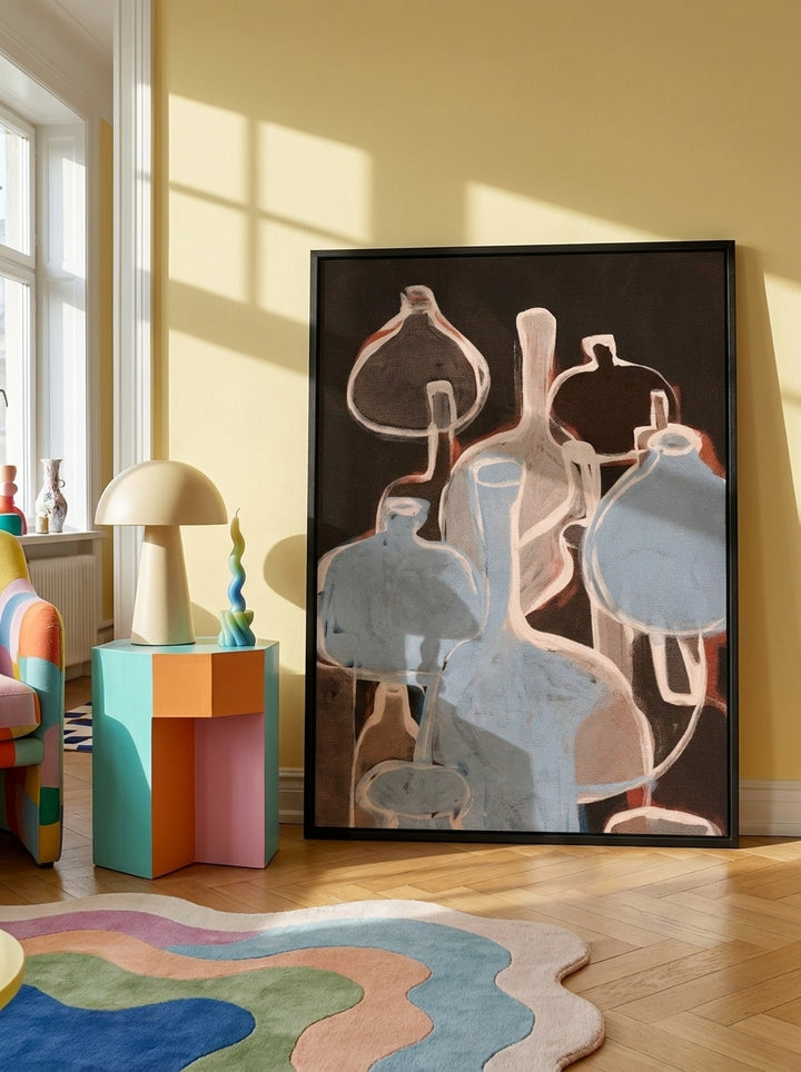 Oversized statement modern wall art print leaning against the wall in a colourful eclectic dining room