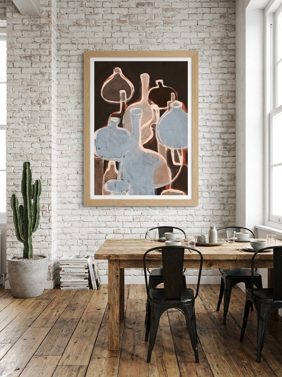 Modern wall art print styled on the wall in an industrial loft dining room