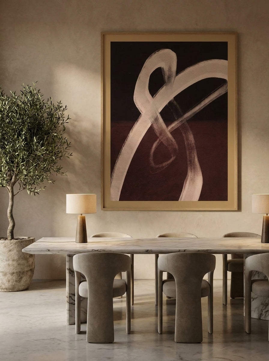 Oversized statement modern wall art print styled on the wall in a luxe dining room