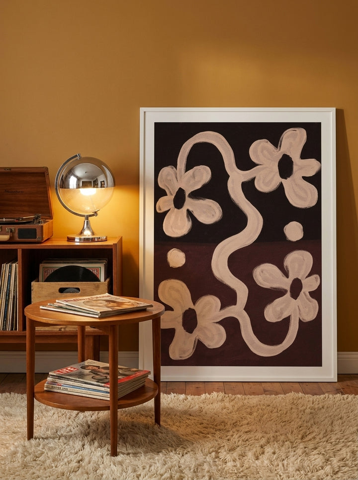 Oversized statement modern wall art print leaning against the wall in a retro 70s dining room