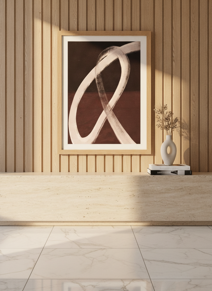 Modern wall art print styled on the wall in a luxe living room