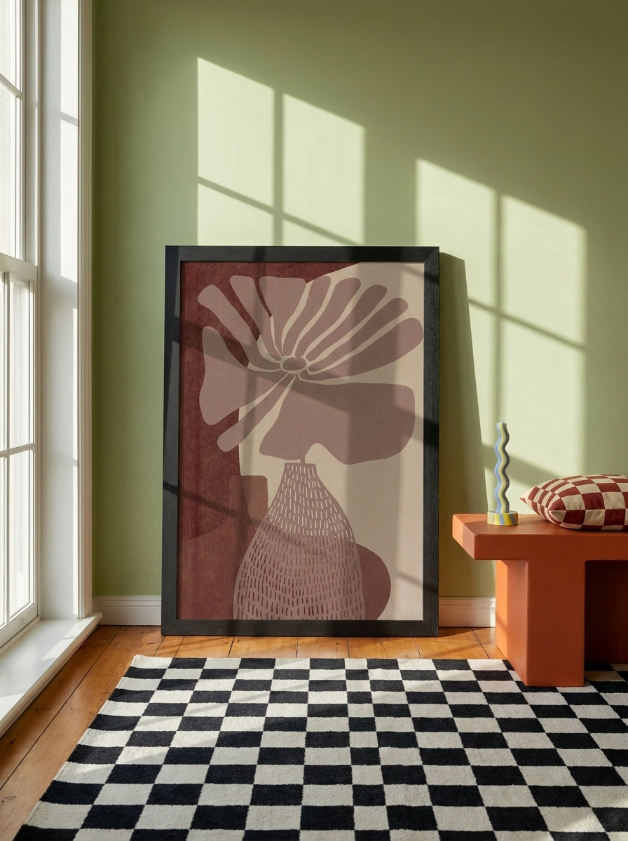 Modern wall art print standing on a side table in a colourful eclectic home office
