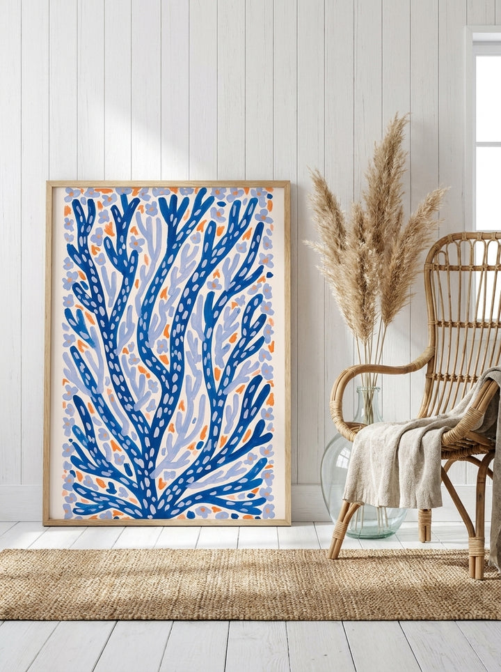 Modern wall art print leaning against the wall in a coastal living room