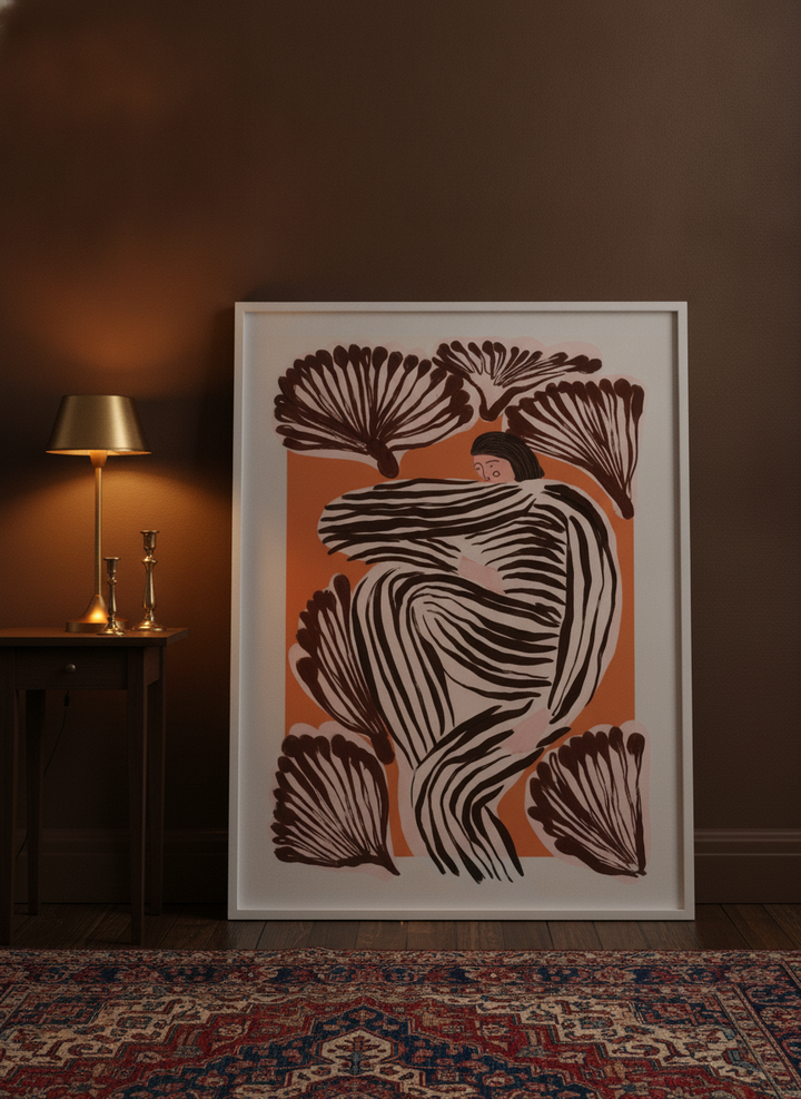 Modern wall art print leaning against the wall in a moody bedroom
