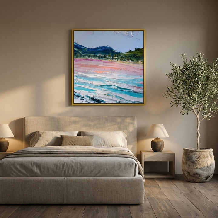 Canvas wall art with a gold leaf surround styled on the wall in a luxe bedroom