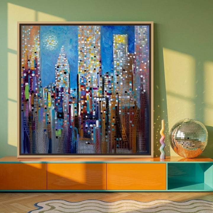 Canvas wall art with a natural timber surround standing on a sideboard in a colourful eclectic home office