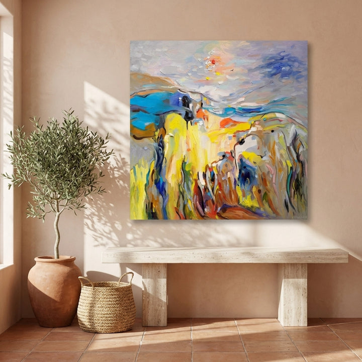 Stretched canvas wall art styled on the wall in a Mediterranean living room