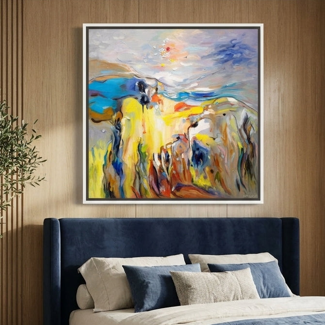 Canvas wall art with a white surround styled on the wall in a luxe bedroom