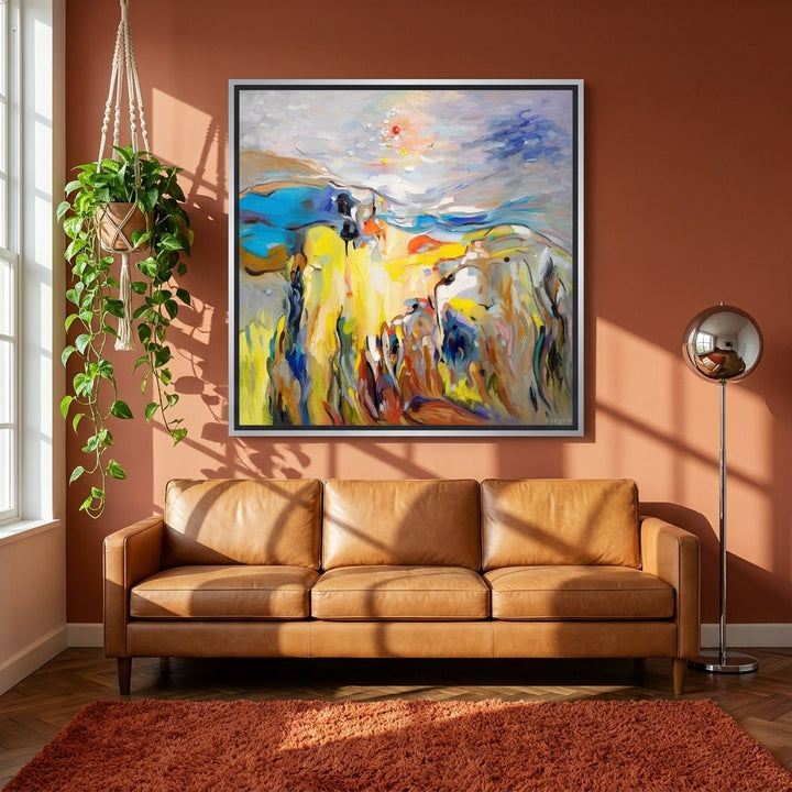 Canvas wall art with a silver leaf surround styled on the wall in a retro 70s living room