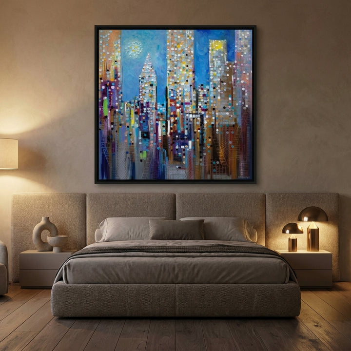Oversized statement canvas wall art with a black surround styled on the wall in a luxe bedroom