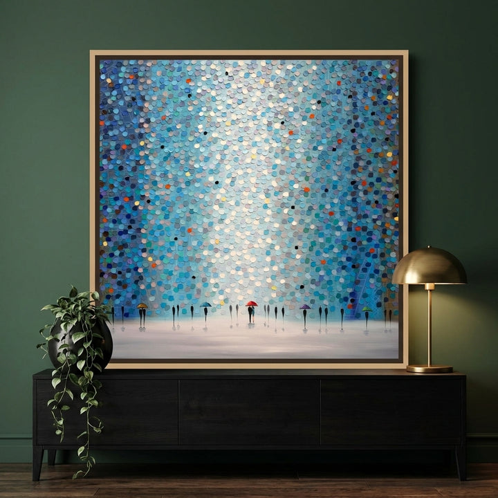 Canvas wall art with a natural timber surround standing on a console in a moody home office