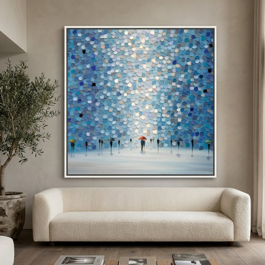 Oversized statement canvas wall art with a white surround styled on the wall in a luxe living room