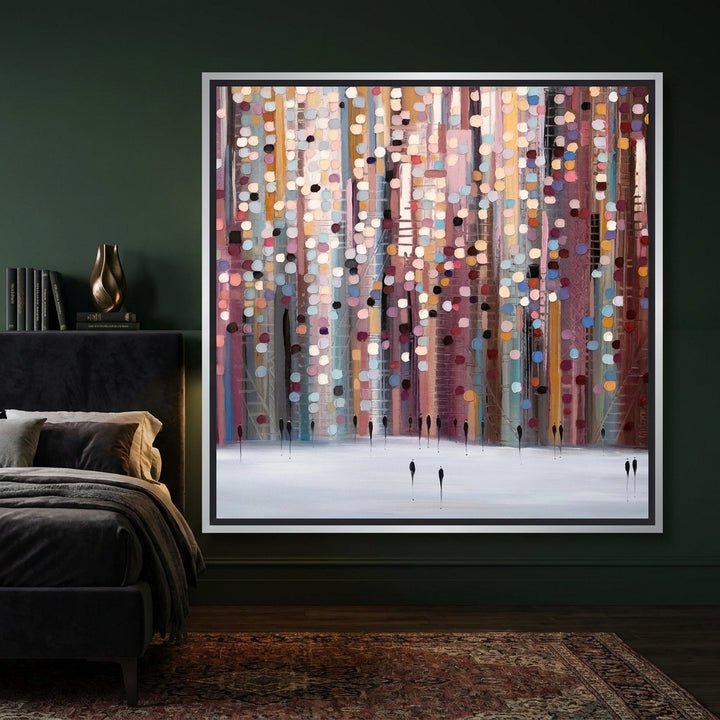 Canvas wall art with a silver leaf surround styled on the wall in a moody bedroom