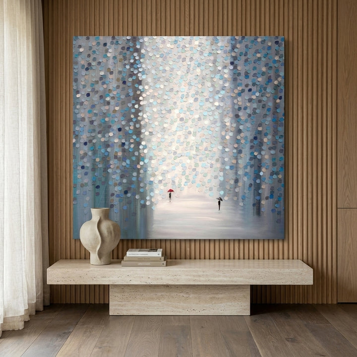 Stretched canvas wall art styled on the wall in a luxe living room