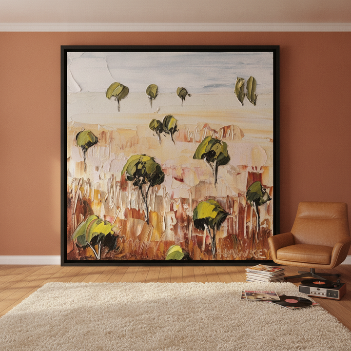 Oversized statement canvas wall art with a black surround leaning against the wall in a retro 70s dining room