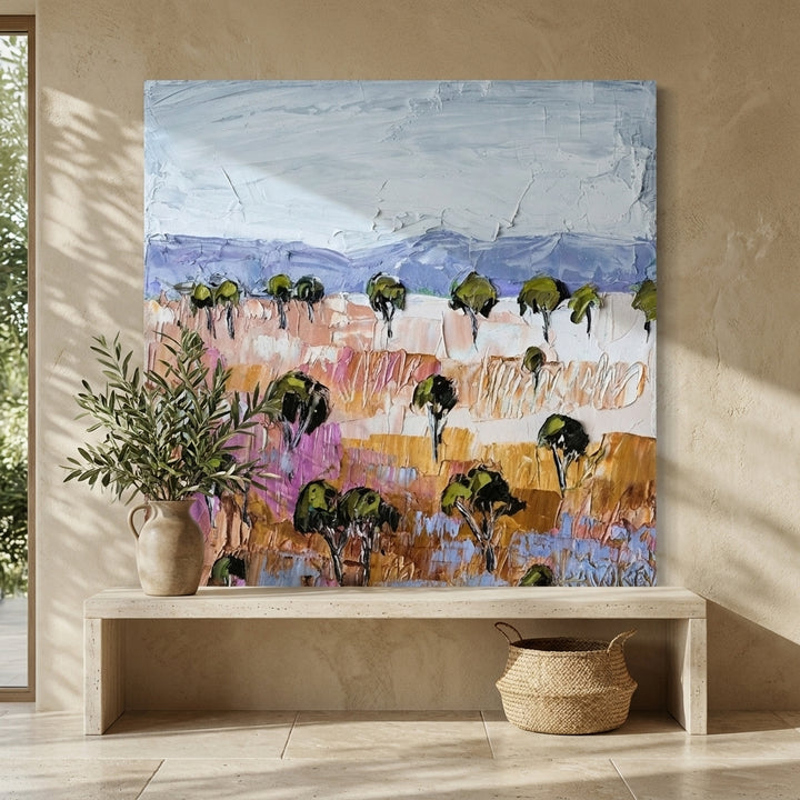 Stretched canvas wall art styled on the wall in a Mediterranean living room