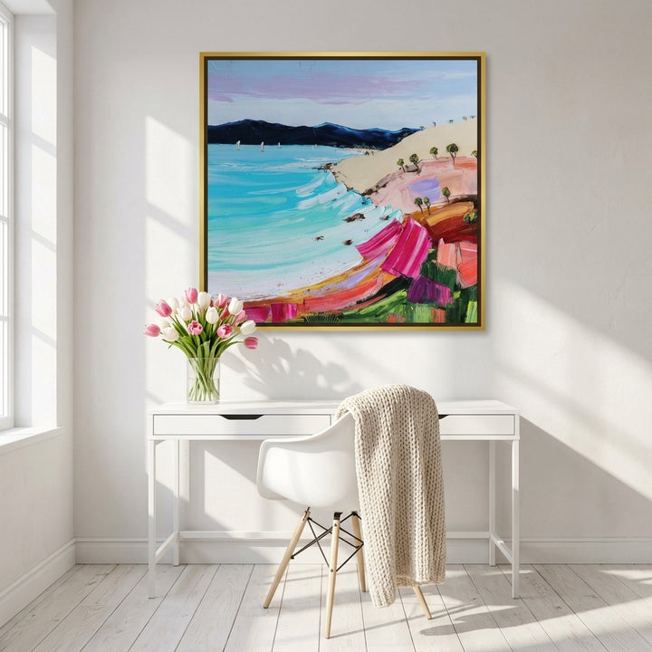 Canvas wall art with a gold leaf surround styled on the wall in a bright Scandinavian home office