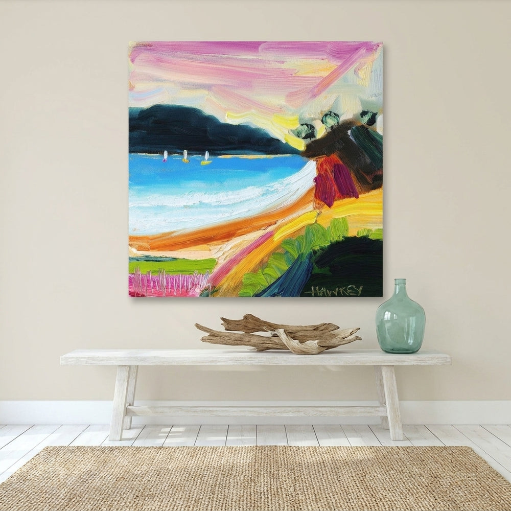 Stretched canvas wall art styled on the wall in a coastal living room