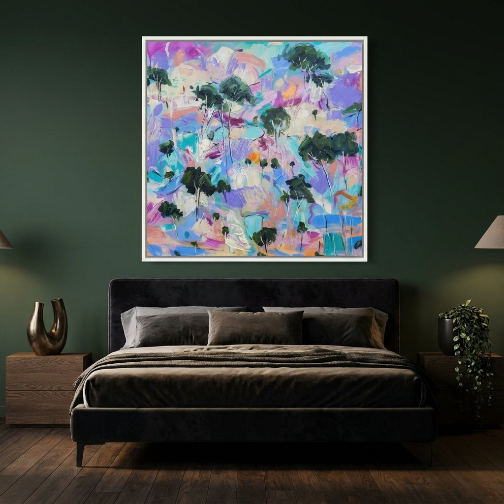 Canvas wall art with a white surround styled on the wall in a moody bedroom