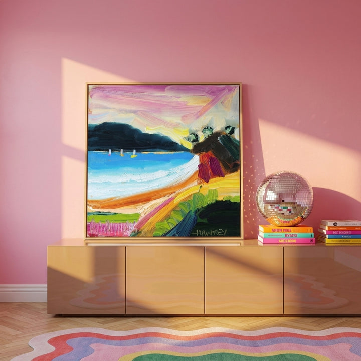 Canvas wall art with a natural timber surround standing on a sideboard in a colourful eclectic bedroom