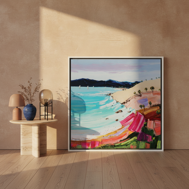 Canvas wall art with a white surround leaning against the wall in a luxe bedroom
