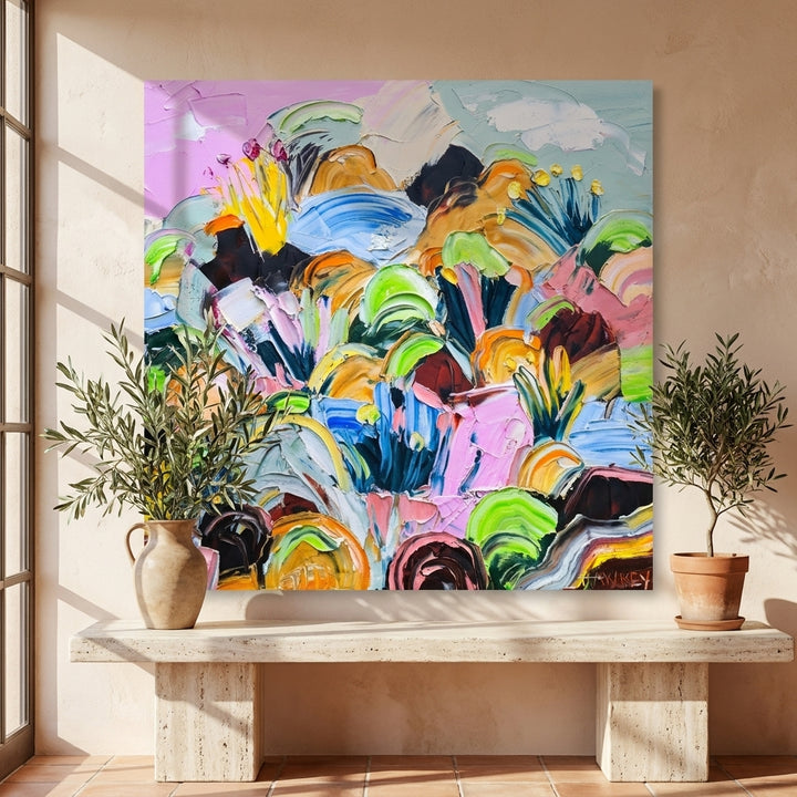 Stretched canvas wall art styled on the wall in a Mediterranean living room