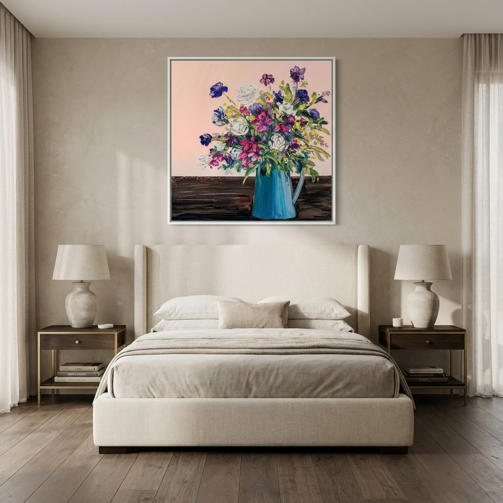 Canvas wall art with a white surround styled on the wall in a luxe bedroom