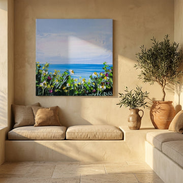 Stretched canvas wall art styled on the wall in a Mediterranean living room