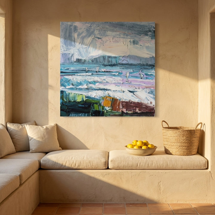 Stretched canvas wall art styled on the wall in a Mediterranean living room