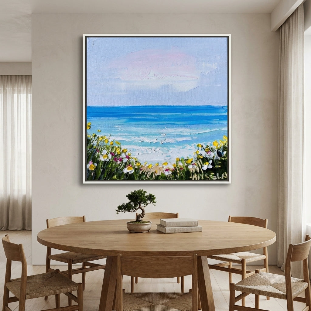 Oversized statement canvas wall art with a white surround styled on the wall in a warm Japandi dining room