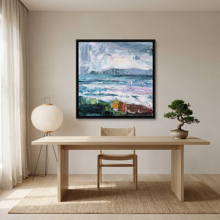 Canvas wall art with a black surround styled on the wall in a warm Japandi home office
