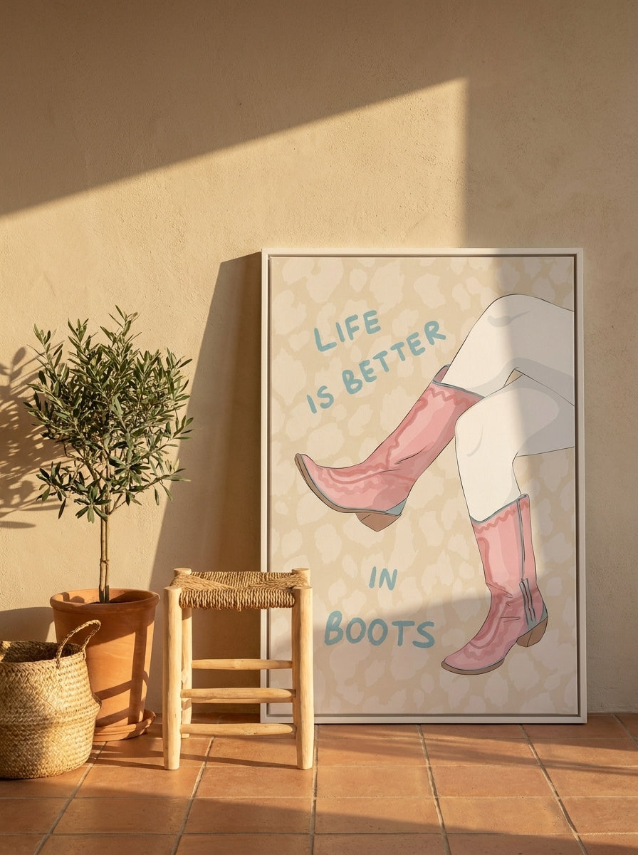 Canvas wall art with a white surround leaning against the wall in a Mediterranean home office