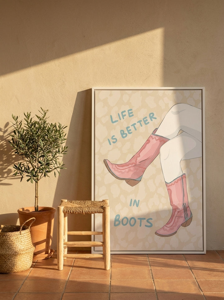 Canvas wall art with a white surround leaning against the wall in a Mediterranean home office