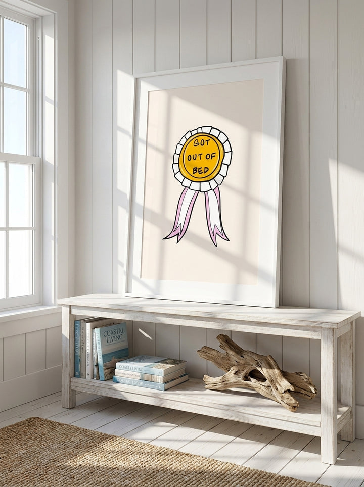 Modern wall art print standing on a console in a coastal home office