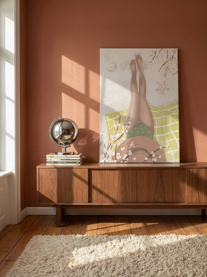 Stretched canvas wall art standing on a sideboard in a retro 70s bedroom