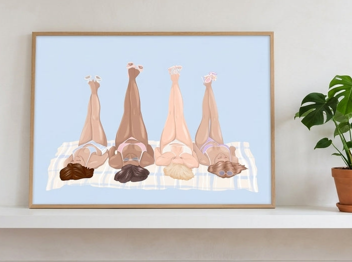 Modern wall art print standing on a shelf in a bright Scandinavian living room