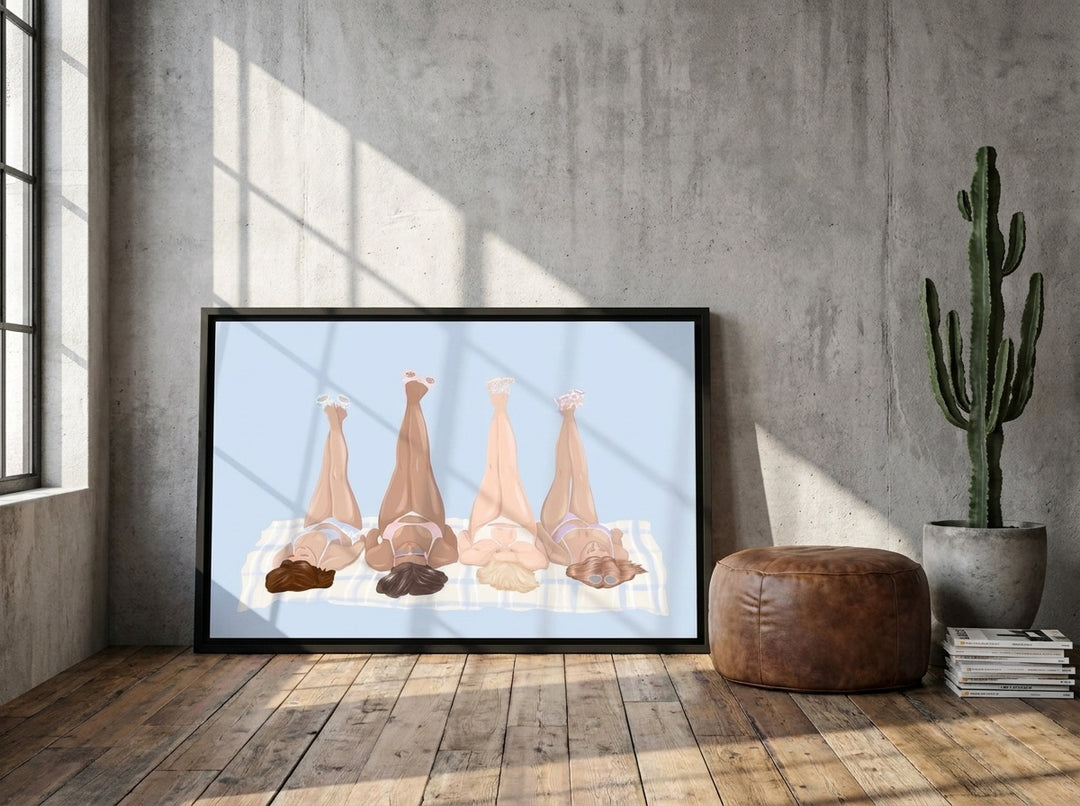 Canvas wall art with a black surround leaning against the wall in an industrial loft living room