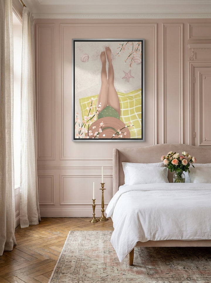 Oversized statement canvas wall art with a silver leaf surround styled on the wall in a Parisian bedroom