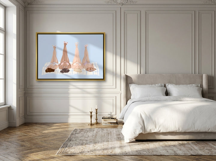 Oversized statement canvas wall art with a gold leaf surround styled on the wall in a Parisian bedroom