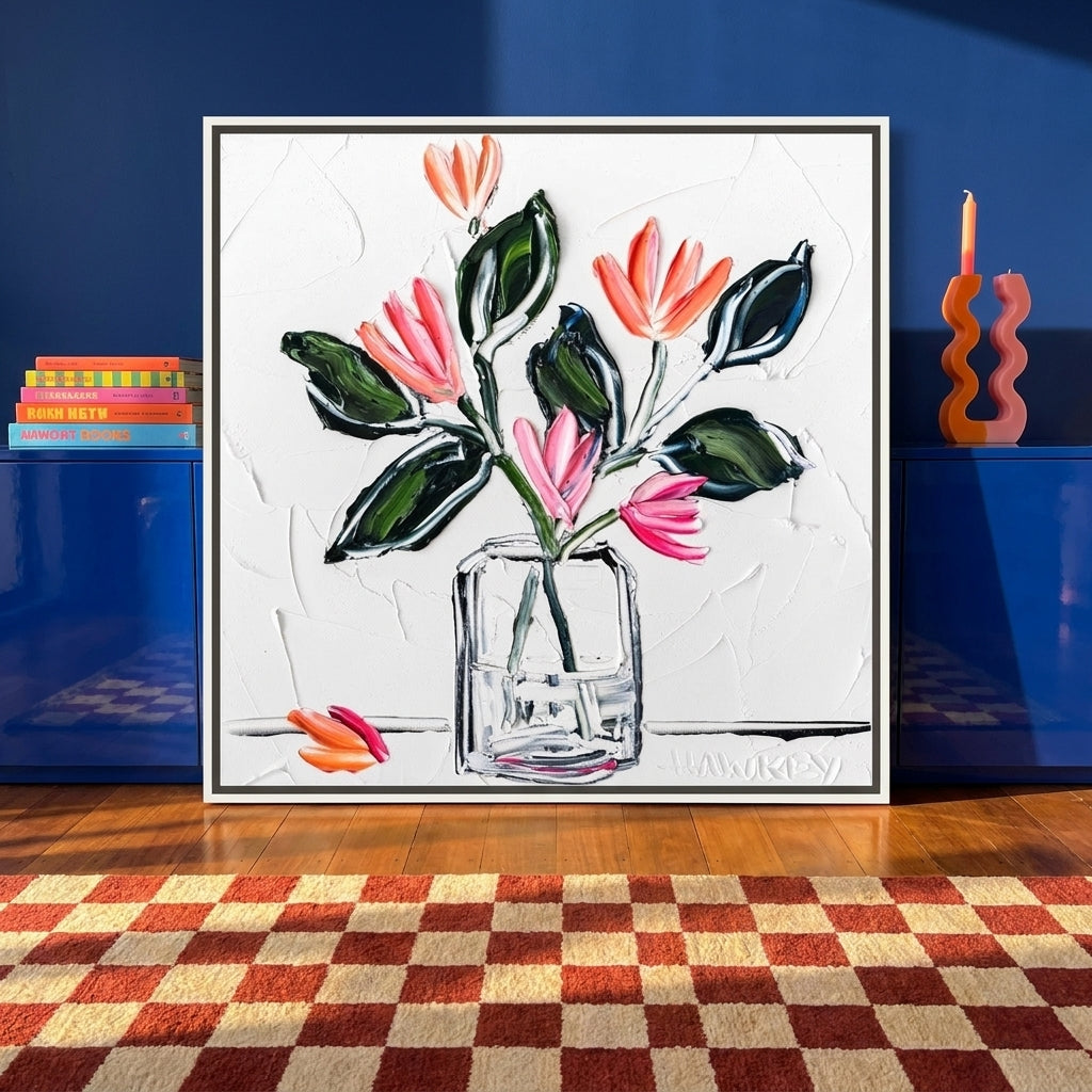 Canvas wall art with a white surround standing on a sideboard in a colourful eclectic bedroom